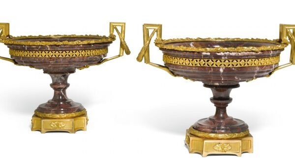 A pair of Louis XVI style gilt-bronze mounted carved and turned breccia marble tazze