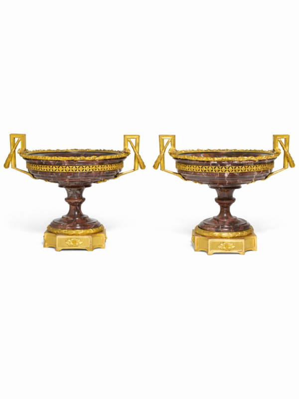 A pair of Louis XVI style gilt-bronze mounted carved and turned breccia marble tazze