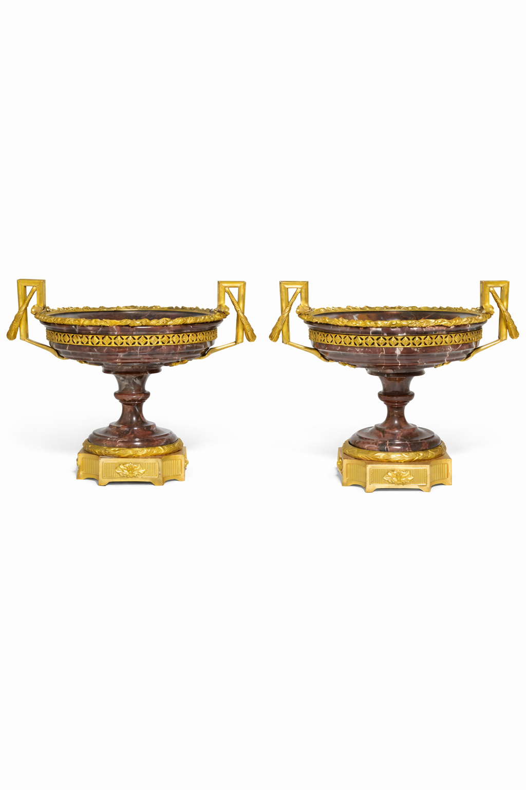 A pair of Louis XVI style gilt-bronze mounted carved and turned breccia marble tazze