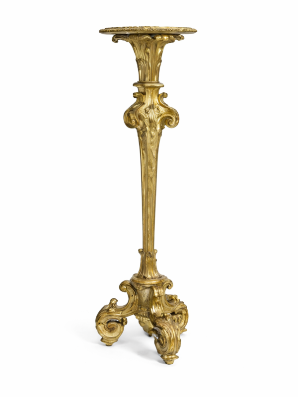 A Régence style carved giltwood torchère