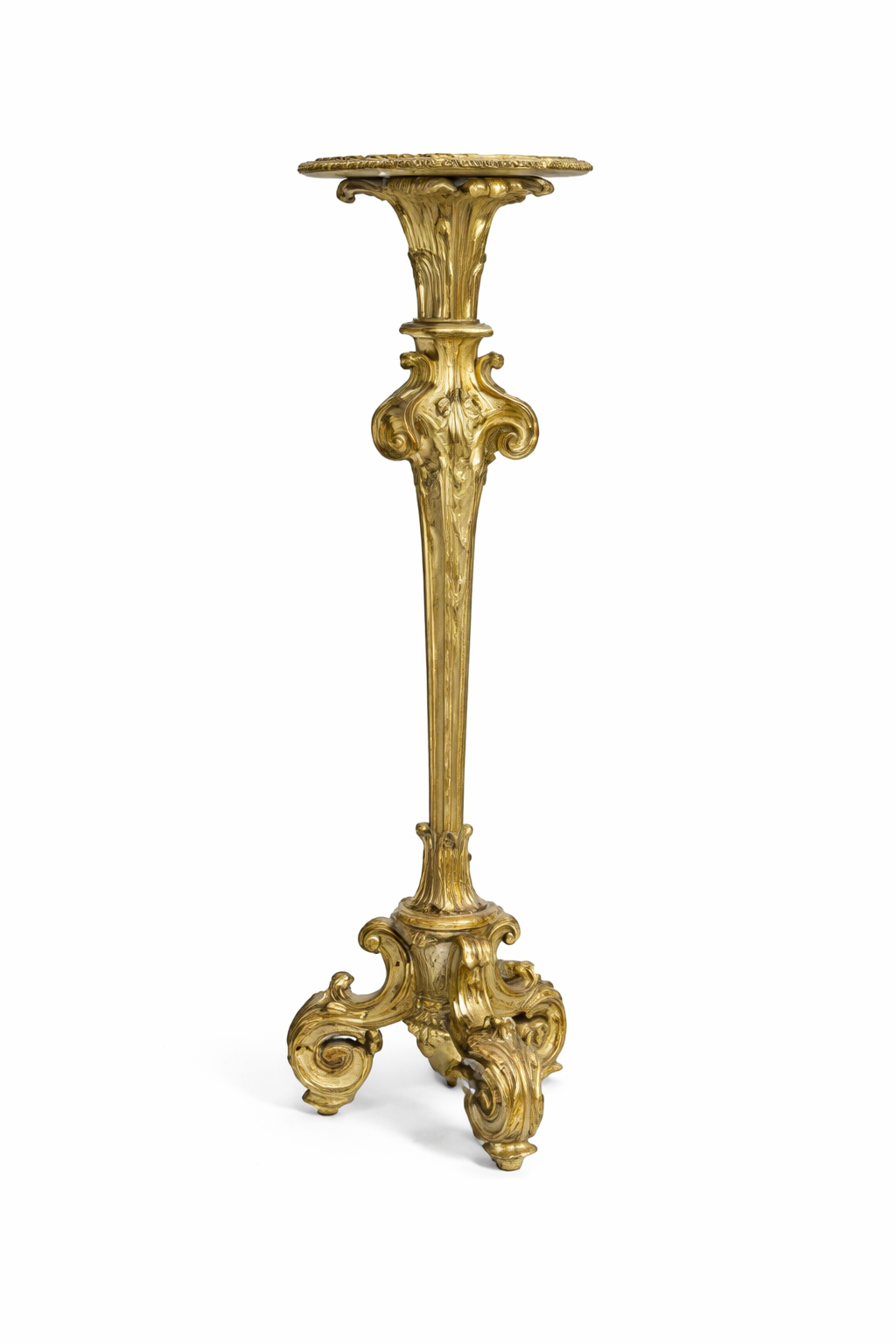 A Régence style carved giltwood torchère