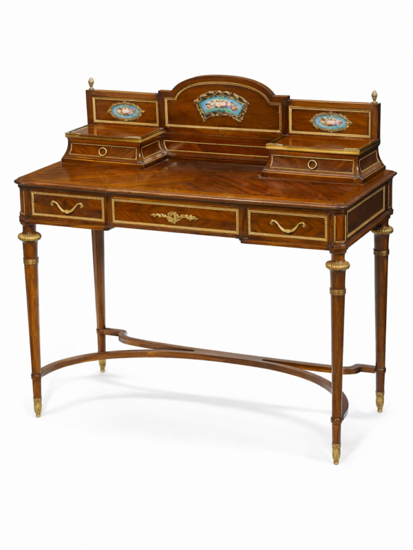 An Edmund Poteau French gilt bronze and porcelain mounted mahogany table à écrire