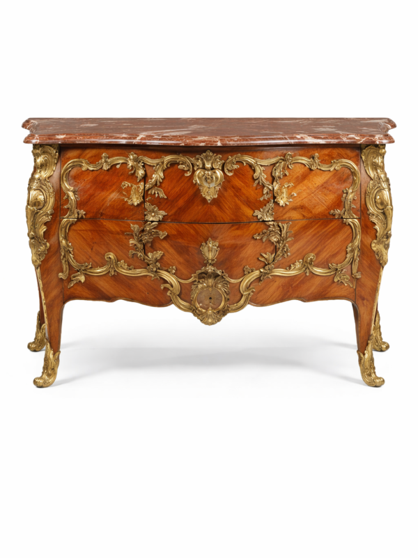 A late 19th century Louis XV style gilt bronze mounted mahogany commode