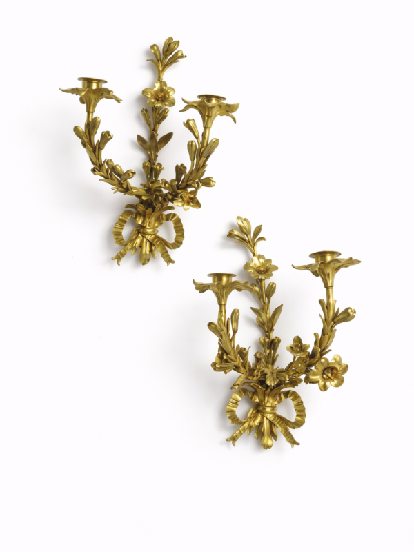 HENRI DASSON signed and dated 1891. pair of gilt bronze lily cast twin-light corner wall appliques.