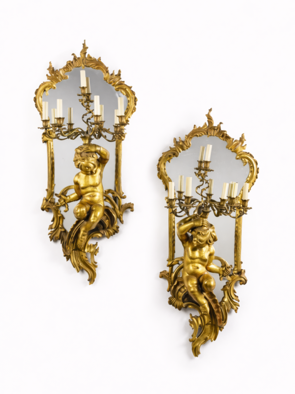French pair of Napoleon III carved gilt wood six-light girandoles. Provenance: France or Italy Circa 1870.