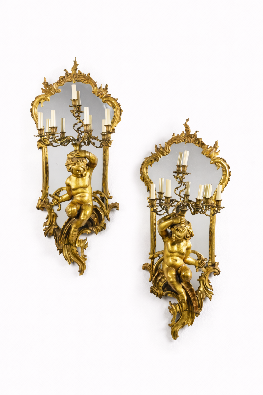 French pair of Napoleon III carved gilt wood six-light girandoles. Provenance: France or Italy Circa 1870.