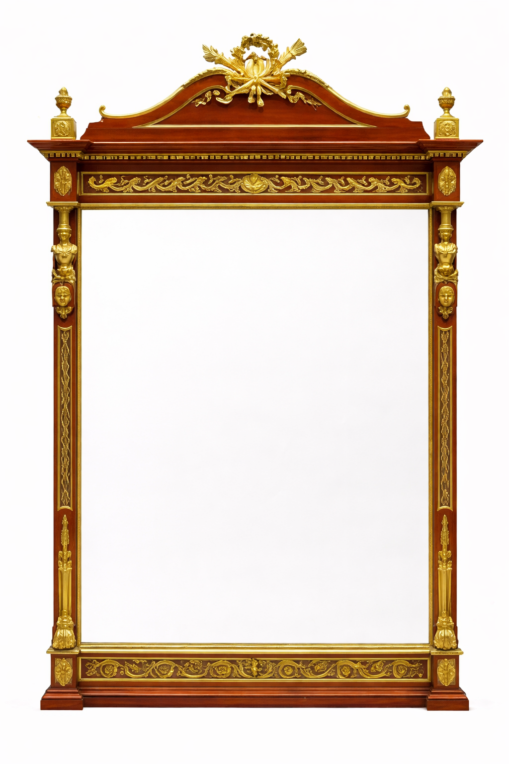 A Louis XVI style gilt bronze mounted mahogany mirror