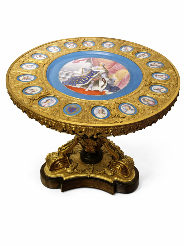A French gilt bronze and Sevres porcelain mounted circular center table, Circa 1890